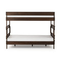 Modern dark wood bunk bed with white mattresses, minimalist design for kids or guest bedrooms.