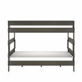 Modern dark wood twin-over-twin bunk bed with full-length guardrails, side ladder and white mattresses, space-saving platform bed for kids and teens
