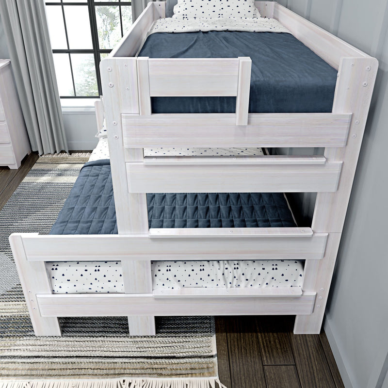 White wooden bunk bed with navy and white bedding in a modern bedroom setting.