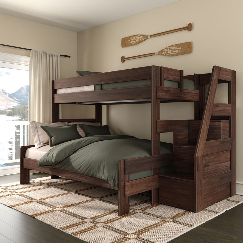 Dark walnut wooden bunk bed with integrated storage stairs and olive-green bedding in a cozy rustic bedroom with decorative oars on the wall and a mountain lake view through the window