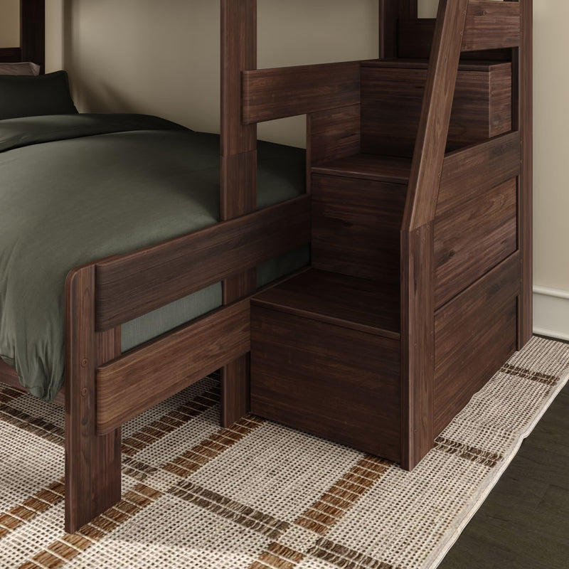 Dark walnut solid wood bunk bed with built-in storage stairs, dark green bedding on lower bunk and woven area rug on hardwood floor