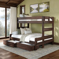 Rustic dark wood bunk bed with trundle storage drawers, neutral bedding and pillows in a cabin bedroom with large windows and forest lake wall art