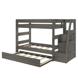 Gray wooden twin-over-full bunk bed with built-in staircase storage, pull-out trundle drawer and slatted mattress supports — space-saving kids bedroom furniture