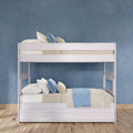 White wooden bunk bed with beige bedding, blue throw and striped pillows against a textured blue wall on a hardwood floor — modern space-saving kids' bedroom furniture and décor