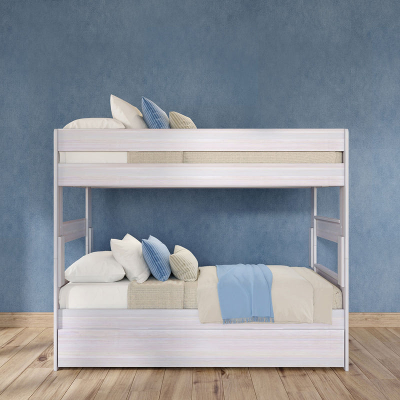 White wooden bunk bed with beige bedding, blue throw and striped pillows against a textured blue wall on a hardwood floor — modern space-saving kids' bedroom furniture and décor