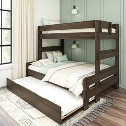 Triple bunk bed with trundle in a cozy, modern bedroom with natural light.