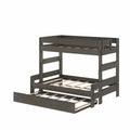 Dark gray solid wood bunk bed with pull-out trundle, slatted mattress supports, guardrails and ladder — space-saving kids' bedroom furniture
