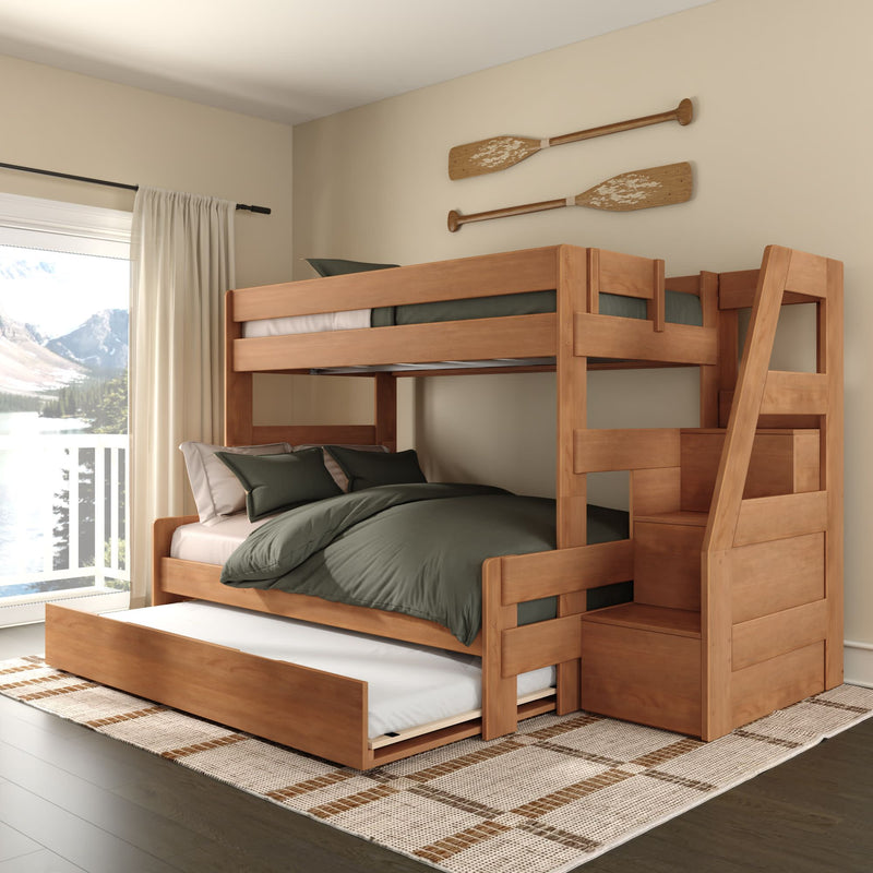 Solid wood bunk bed with trundle and storage stairs, green bedding in a rustic kids' bedroom overlooking a mountain lake
