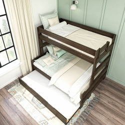 Dark wood bunk bed with cozy bedding and pull-out trundle in a modern, light-toned bedroom.