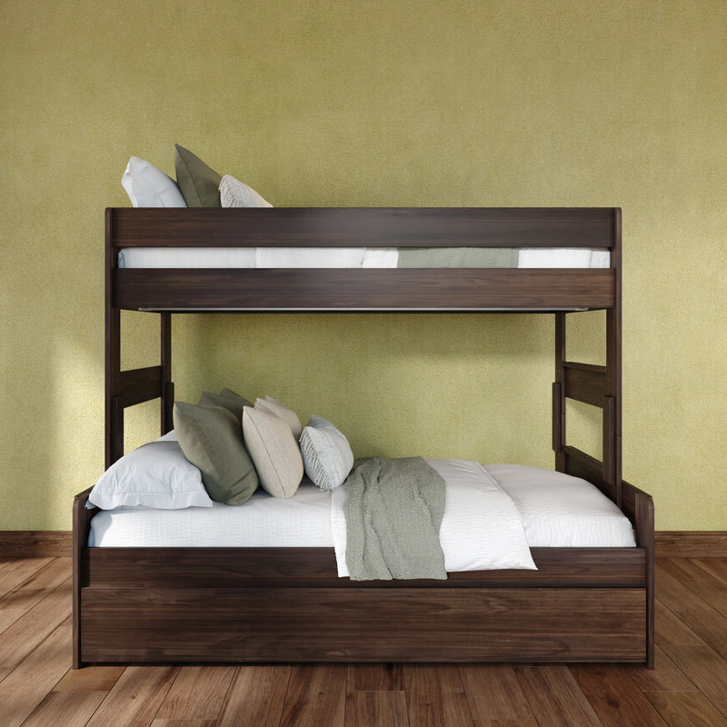 Dark walnut wooden bunk bed with full-size lower bed, white linens, sage green throw and pillows, hardwood floor and textured green wall