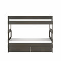Modern twin-over-twin bunk bed in dark gray wood finish with white mattresses, built-in ladder, guardrails and two under-bed storage drawers
