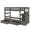 Gray wooden twin-over-full bunk bed with built-in staircase, under-bed storage drawers and slatted platform in rustic gray finish