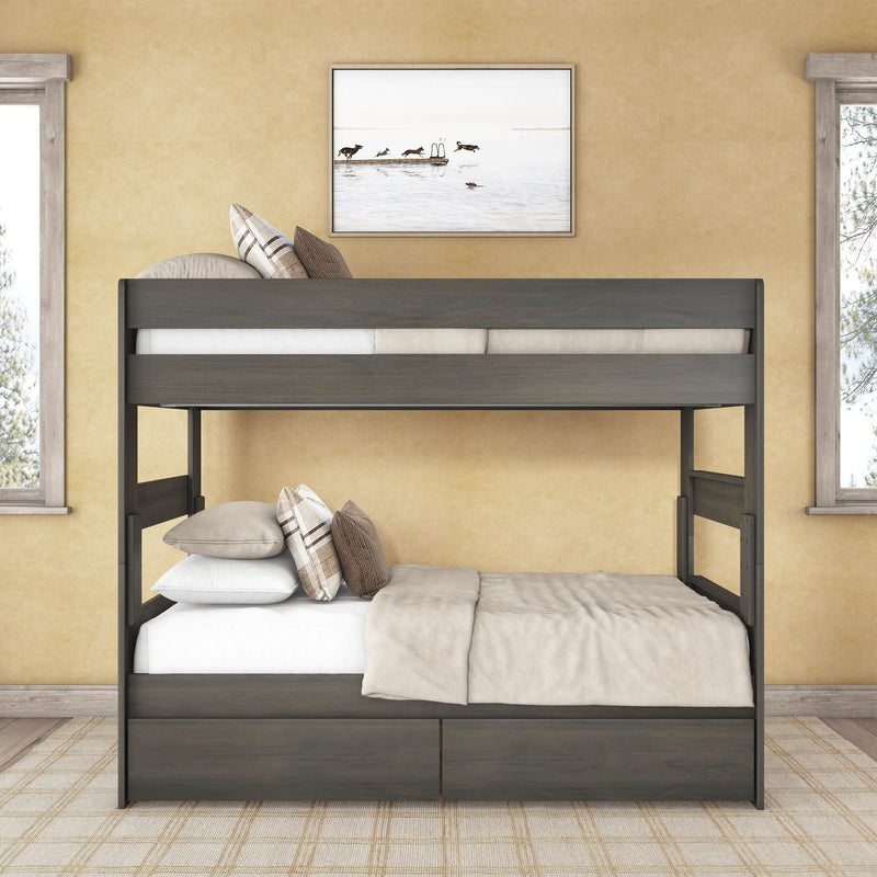 Gray wood twin-over-full bunk bed with two under-bed storage drawers, neutral linens and plaid pillows in a cozy beige bedroom