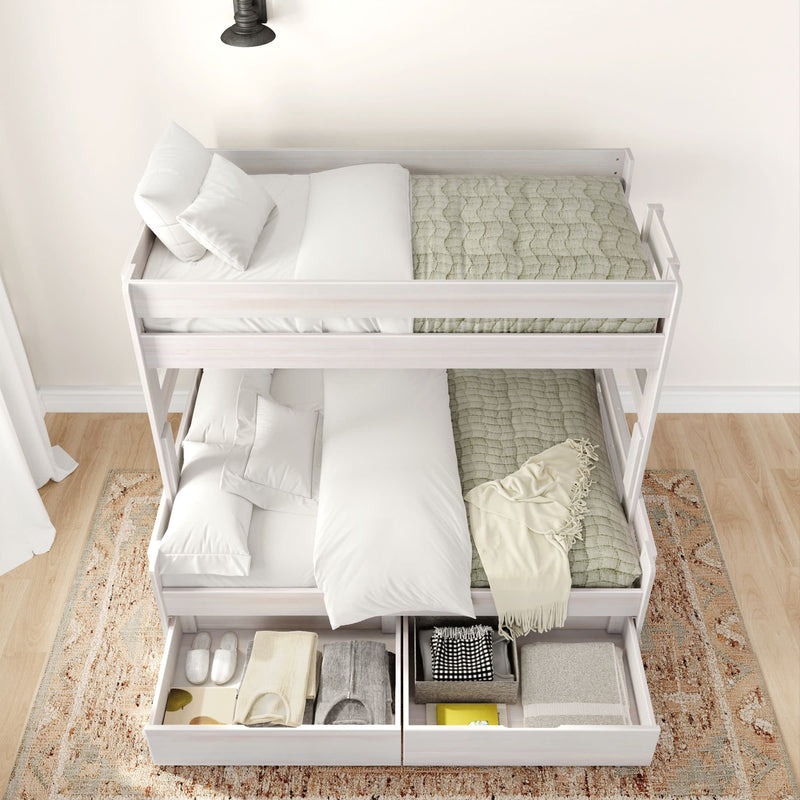 White bunk bed with green quilts and organized storage drawers, modern bedroom furniture.