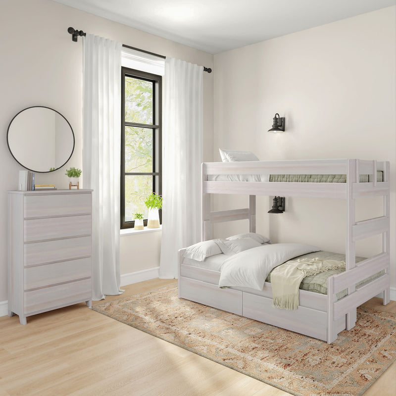 Modern bedroom with a white wooden bunk bed, cozy bedding, and a dresser, accented by natural light from a large window and complemented by a stylish wall-mounted light fixture.
