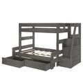 Modern gray wooden bunk bed with staircase, built-in under-bed storage drawers and guardrails — space-saving kids' loft bed