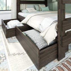 Wooden bed frame with storage drawers featuring cozy, neatly arranged bedding for optimized bedroom organization.