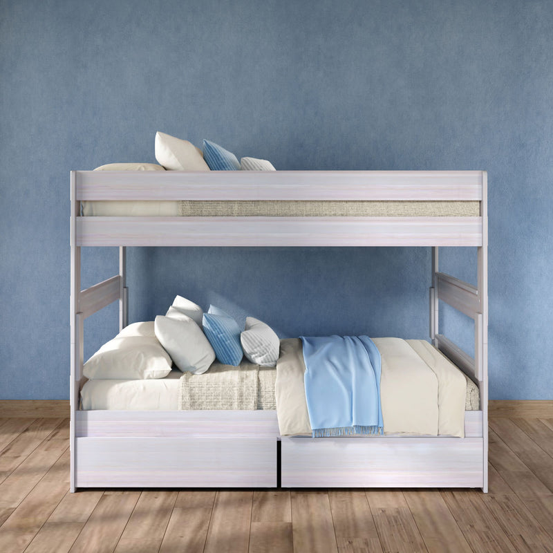 White wooden twin-over-full bunk bed with storage drawers, blue and beige bedding in a modern kids' bedroom with hardwood floor and textured blue wall