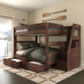 Solid wood twin-over-full bunk bed with built-in storage drawers and staircase, dark green bedding and rustic paddle wall decor in a space-saving lake-view bedroom