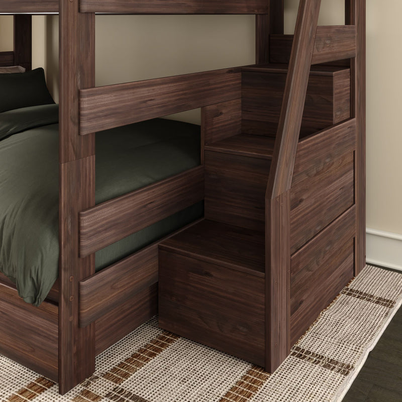 Dark walnut wooden bunk bed with built-in staircase storage drawers, green bedding and woven area rug in a modern bedroom