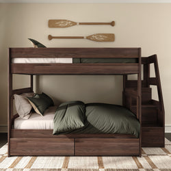 Dark wood bunk bed with staircase and built-in storage drawers, olive green bedding and pillows, nautical wooden oar wall decor in a modern neutral bedroom