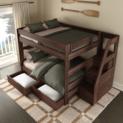 Dark walnut wooden bunk bed with built-in storage stairs and under-bed drawers, green bedding and pillows, rustic oar wall decor and sunlit balcony lake view in cozy bedroom