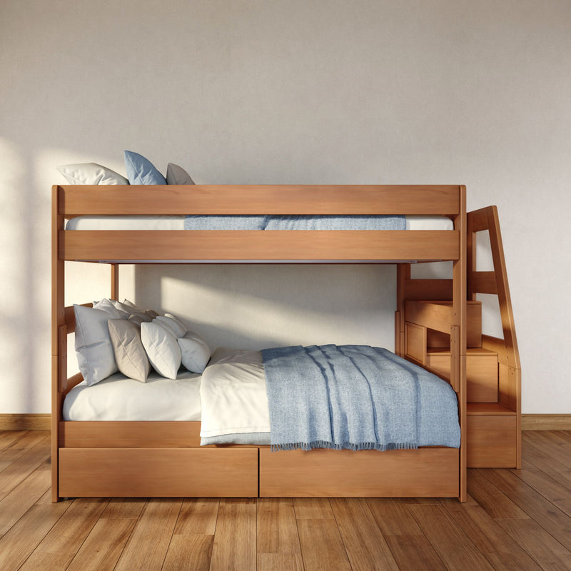 Solid wood bunk bed with built-in storage stairs and blue bedding in a modern kids' bedroom — space-saving wooden bunk design
