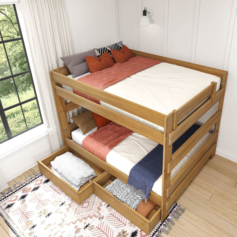 Wooden twin-over-twin bunk bed with storage drawers and colorful bedding in a bright, modern bedroom.