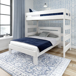 White wooden bunk bed with navy bedding in a modern bedroom with patterned wallpaper and large window.