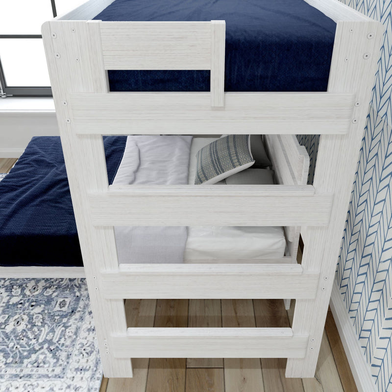 White wooden bunk bed with navy blue bedding and decorative pillow in a modern bedroom setting.