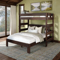 Rustic dark wood twin-over-full bunk bed in cozy cabin bedroom with neutral bedding, green walls, landscape wall art and large curtained window