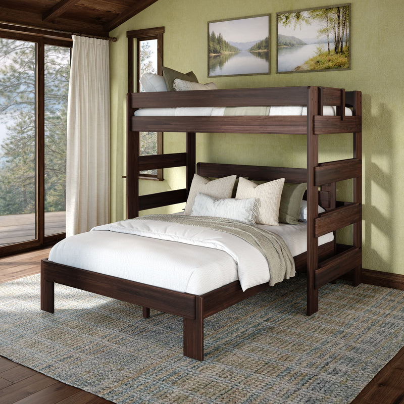Rustic dark wood twin-over-full bunk bed in cozy cabin bedroom with neutral bedding, green walls, landscape wall art and large curtained window