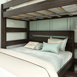 Dark wood bunk bed with comfortable bedding and teal accent pillows in modern bedroom.
