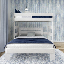 Modern white bunk bed with blue and white bedding in a stylish, patterned bedroom.