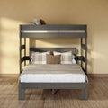 Modern gray wooden bunk bed with neutral beige bedding and plaid throw pillows against a textured beige wall on hardwood floor, space-saving bedroom furniture
