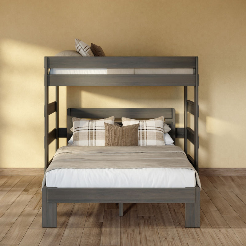 Modern gray wooden bunk bed with neutral beige bedding and plaid throw pillows against a textured beige wall on hardwood floor, space-saving bedroom furniture