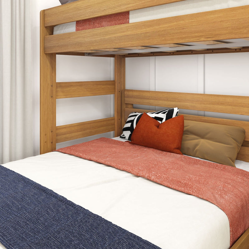 Wooden bunk bed with colorful cushions and blankets in a cozy bedroom setting.