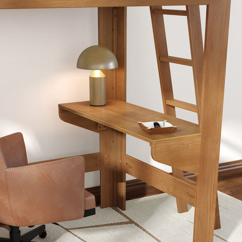 Solid wood loft bed with integrated desk and ladder, metal dome table lamp, leather swivel chair and accessory tray in a compact home office
