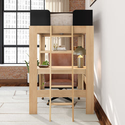 Wooden loft bed with built-in desk and ladder in modern loft apartment; compact home office with leather swivel chair, brass desk lamp, potted plants and exposed brick wall by large industrial window