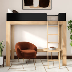 Wooden loft bed with ladder above a cozy reading nook featuring a rust velvet armchair, round side table and houseplants for modern space-saving bedroom design