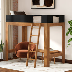 Modern wooden loft bed with ladder over cozy reading nook featuring a rust velvet accent chair, round side table and potted plant in a space-saving bedroom layout