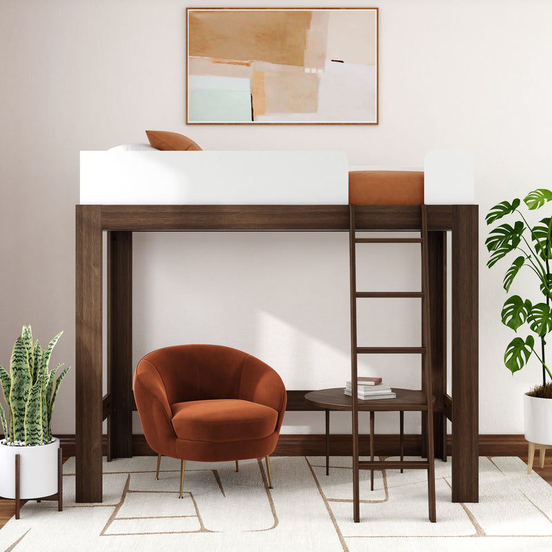 Walnut loft bed with white guardrail and ladder above an orange velvet accent chair, round side table, potted snake plant and monstera, and abstract wall art in a modern minimalist bedroom