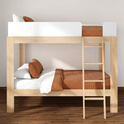 Wooden bunk bed with ladder in modern minimalist bedroom, natural wood twin-over-twin frame, rust orange bedding and white guardrail on hardwood floor