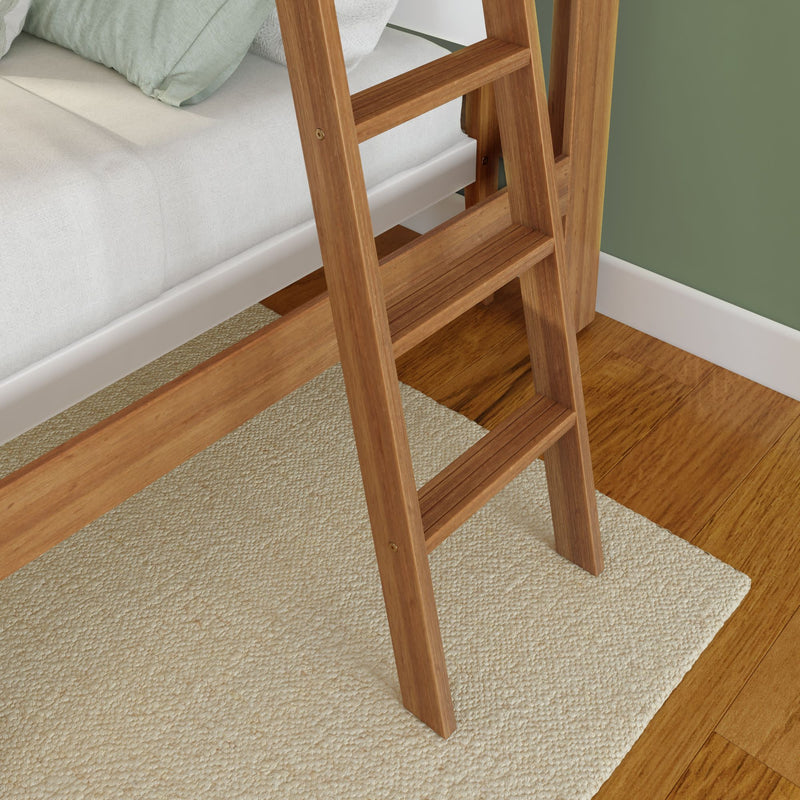 Wooden ladder of a brown bunk bed on beige carpet and wooden floor in a green painted bedroom.