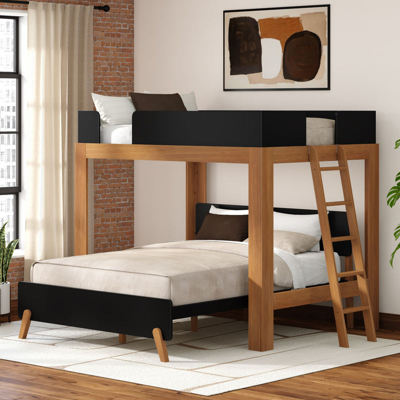 Modern wooden loft bunk bed full-over-twin with black panels and ladder, mid-century style space-saving bedroom furniture with neutral bedding in an urban loft setting