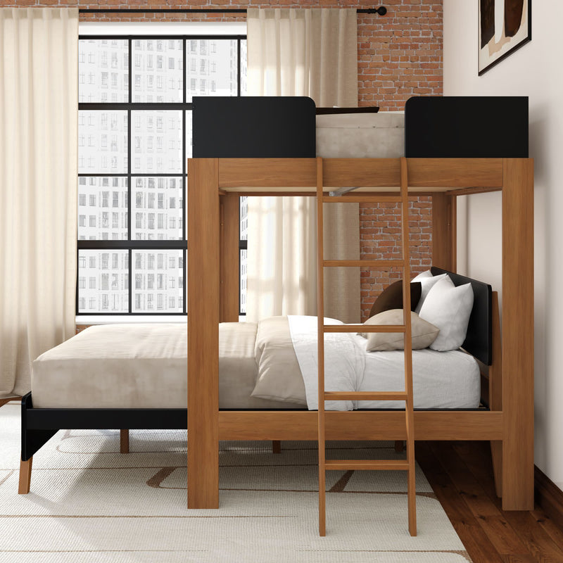 Modern wooden loft bunk bed with ladder and queen-size lower bed, neutral bedding, exposed brick accent wall and large industrial window