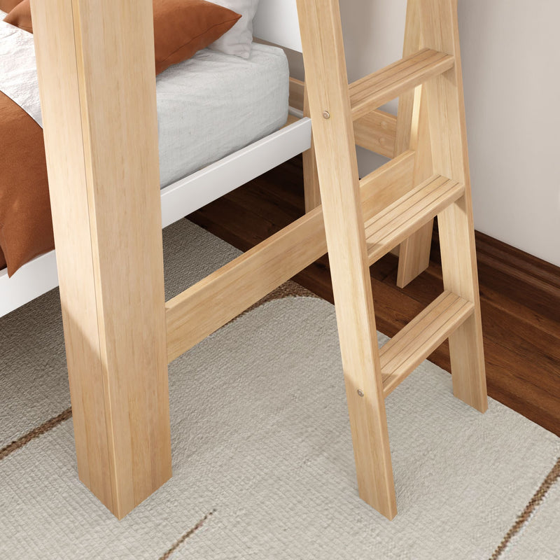 Close-up of light natural wood bunk bed ladder and frame with white mattress and terracotta pillow on beige rug and hardwood floor