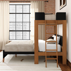 Modern loft bedroom with wooden bunk bed over queen bed, exposed brick wall, large industrial grid window, neutral bedding, ladder and minimalist decor