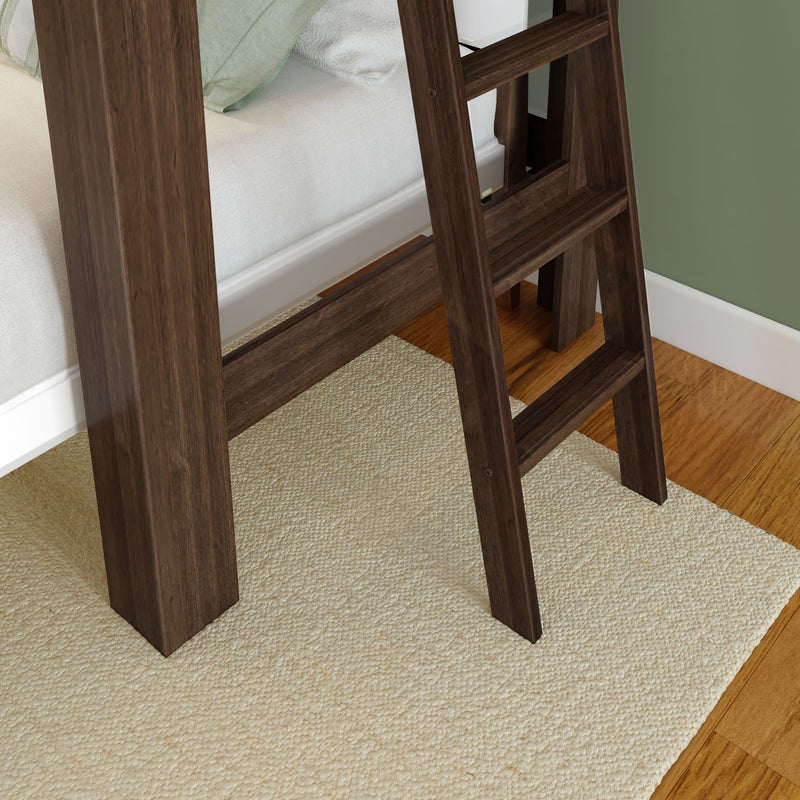 Dark wooden ladder leading to a loft bed on a soft, textured beige carpet in a cozy modern bedroom.