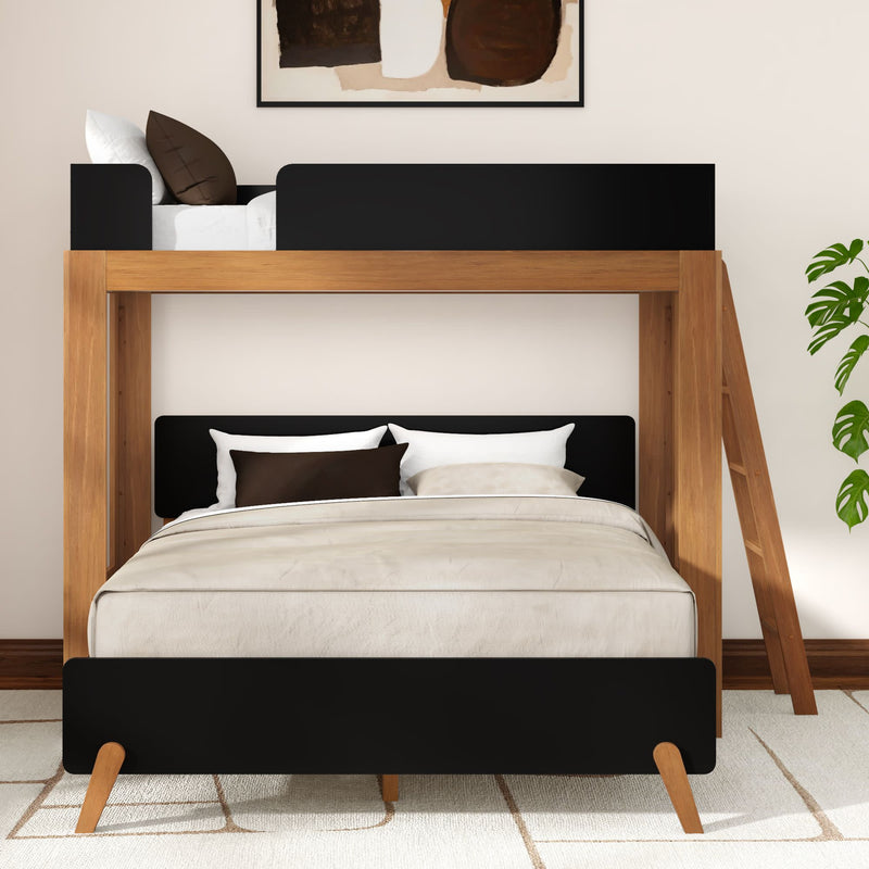 Modern wooden full-over-twin bunk bed with black accents, neutral beige bedding, ladder and houseplant in a contemporary space-saving bedroom designed for kids or guests